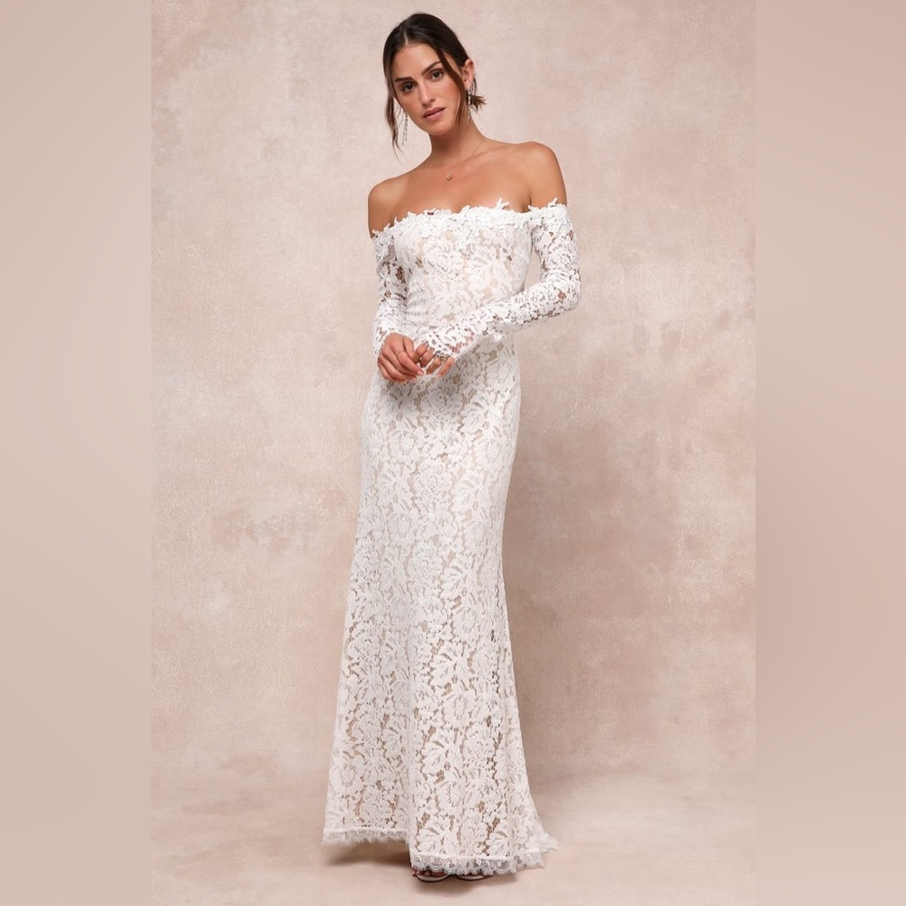 Never worn off the shoulder lace wedding gown! Size medium